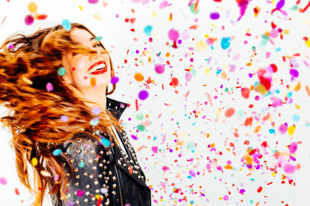 istock Happy party woman with confetti 882512756