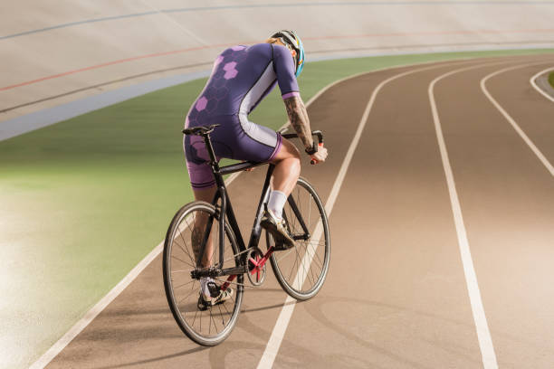 istock cyclist riding bicycle on cycle race track 882516038