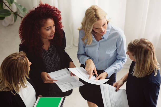 istock Women Working Together In The Office 882517030