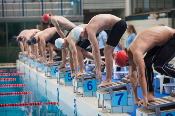istock Start of a swimming competition 882517332