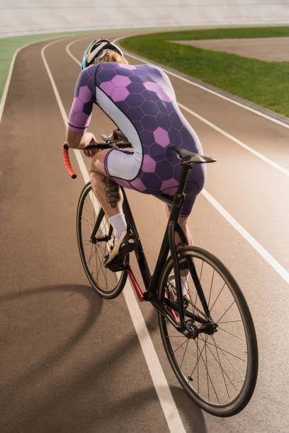 istock cyclist riding bicycle on cycle race track 882524928