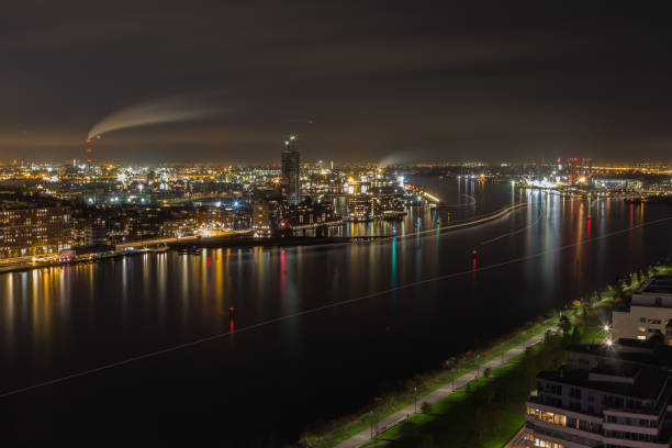 The harbor of Amsterdam by night, viewed from the lookout on the ADAM tower