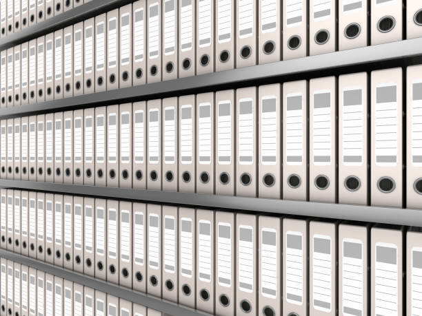 istock white ring binder standing in a row of files 882570118