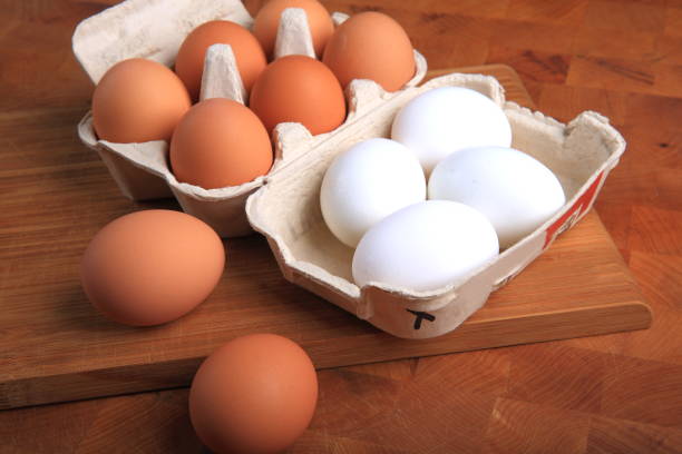 istock Fresh Organic Eggs in a Carton 882574398