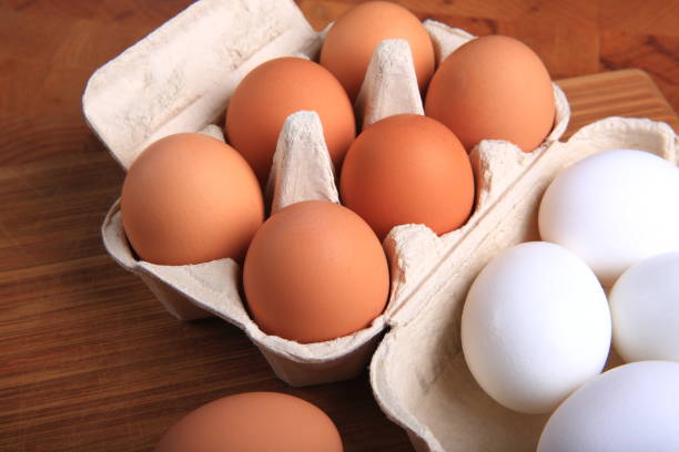 istock Fresh Organic Eggs in a Carton 882574518
