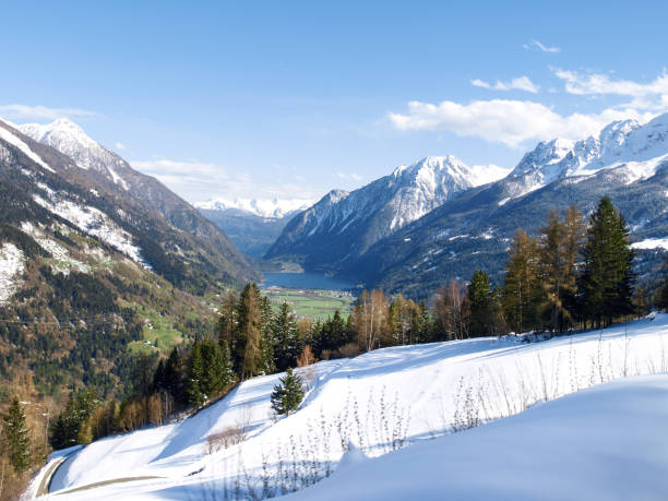 istock Panorama of snowy climbed 882585126