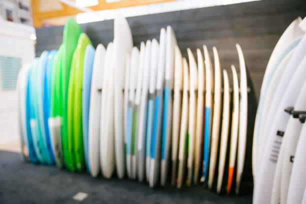 istock Set of different new white surf boards 882595930