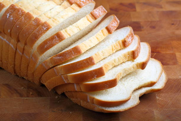 bochenek mleka maślanego biały chleb - baked bread brown carbohydrates zdjęcia i obrazy z banku zdjęć