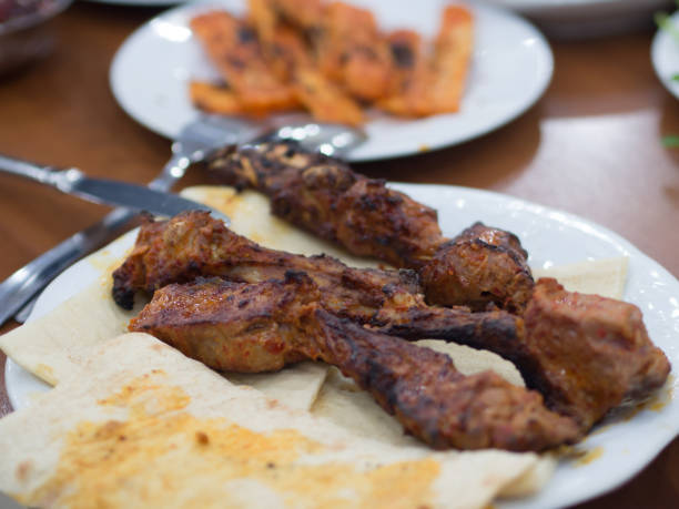 istock white plate of bread and turkish kebab 882605328