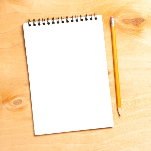 istock Business essentials. Top view of spiral blank notebook. 882614630
