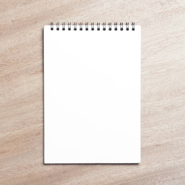 istock Business essentials. Top view of spiral blank notebook. 882614948