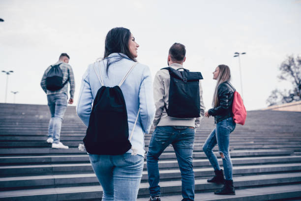 istock Group of Students with Backpacks Walking to School 882633322