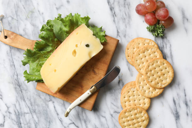 Jarlsberg Cheese Crackers And Grapes stock photo