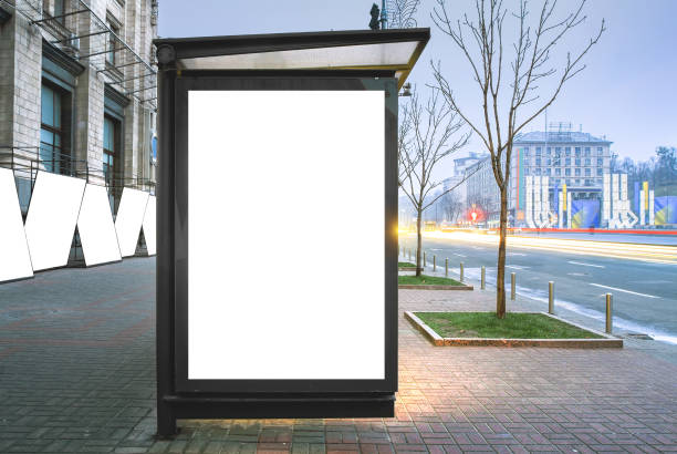 istock Vertical blank glowing billboard on the bus stop. 882640688
