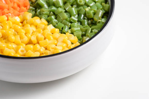 Carrot, pea, corn, green beans, tomato and potatoe