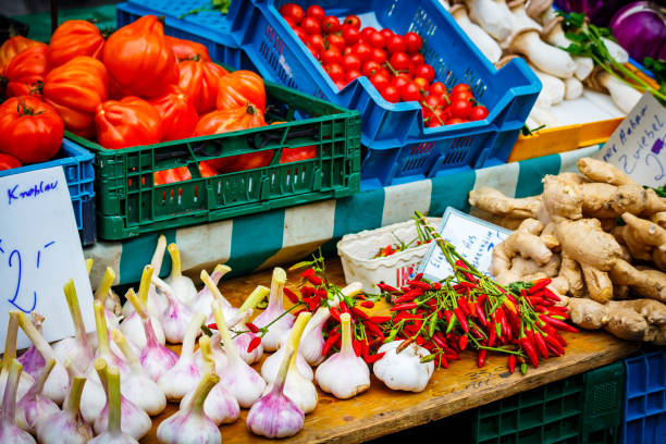 istock Garlic, chili and ginger on a market stall 882667080