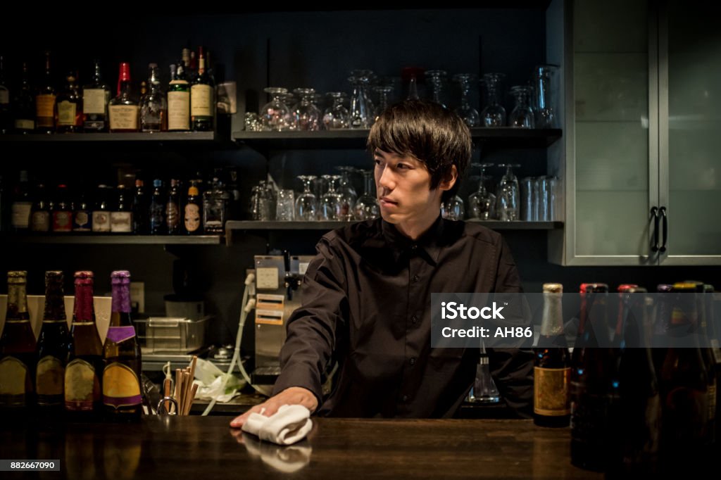 Cool bartender Cool bartender. Bartender Stock Photo