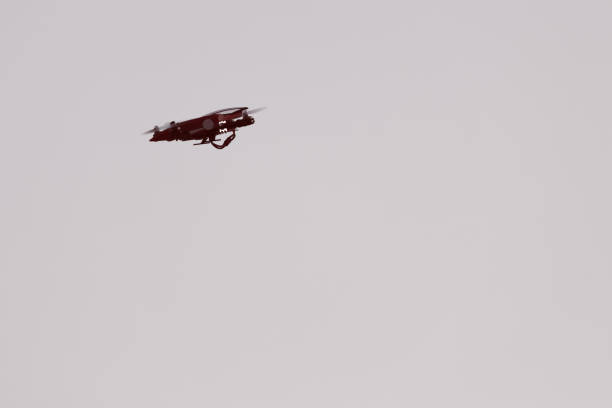 istock detail of a modern drone flying during sunset 882670100