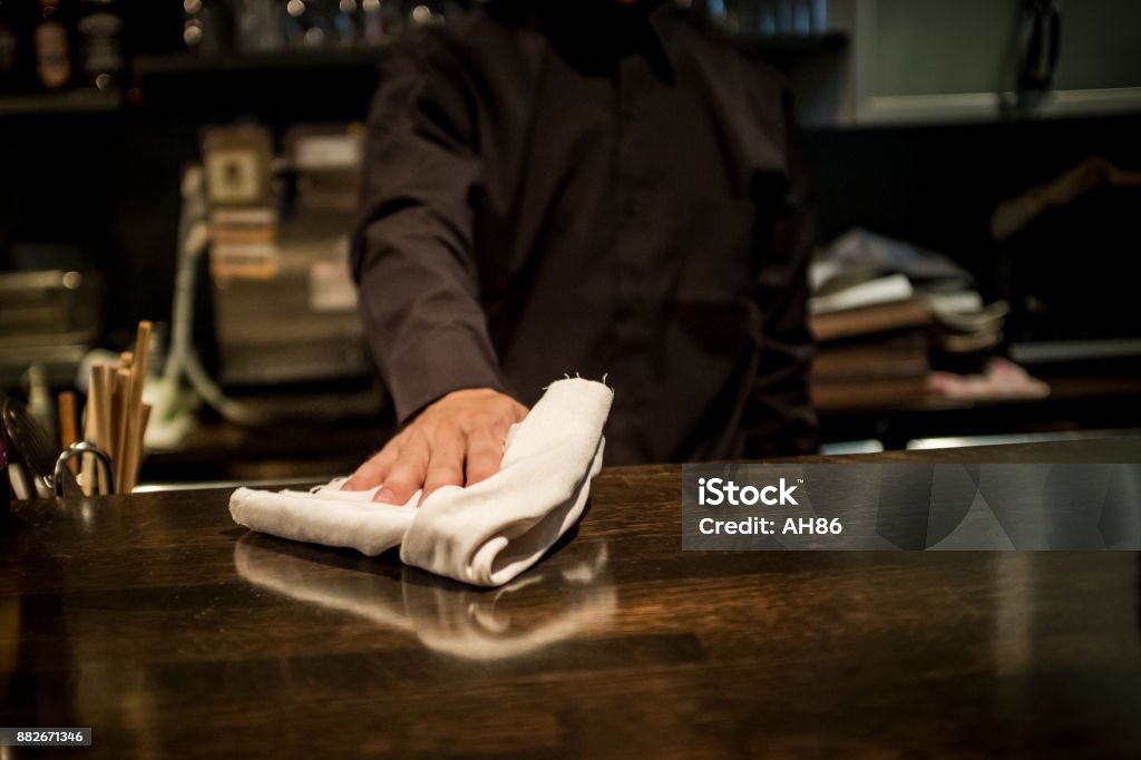 Cool bartender Cool bartender. Cleaning Stock Photo
