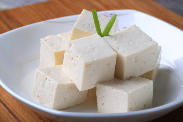 istock Tofu cubes in a white bowl 882687524
