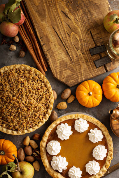istock Fall traditional pies pumpkin, pecan and apple crumble 882690640