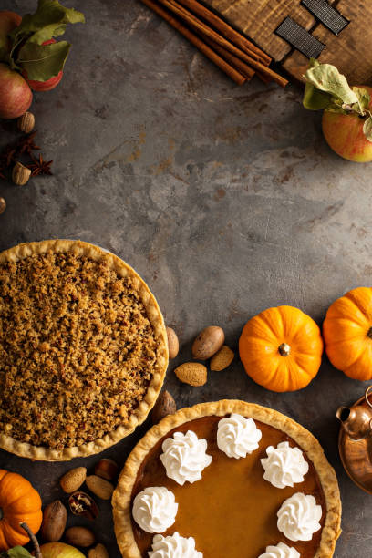 istock Fall traditional pies pumpkin, pecan and apple crumble 882690800