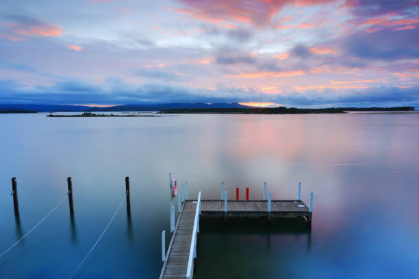 istock Little jetty at dawn serene location 882693448