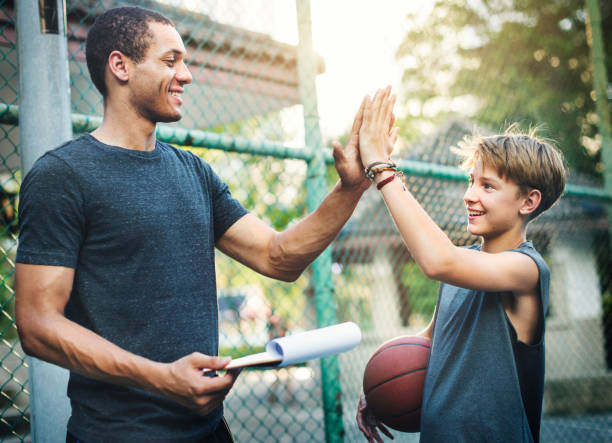 Young basketball player shoot