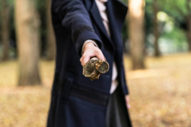 Woman holding a club.