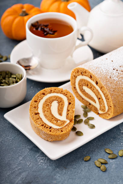 istock Pumpkin roll with cream cheese frosting 882698354