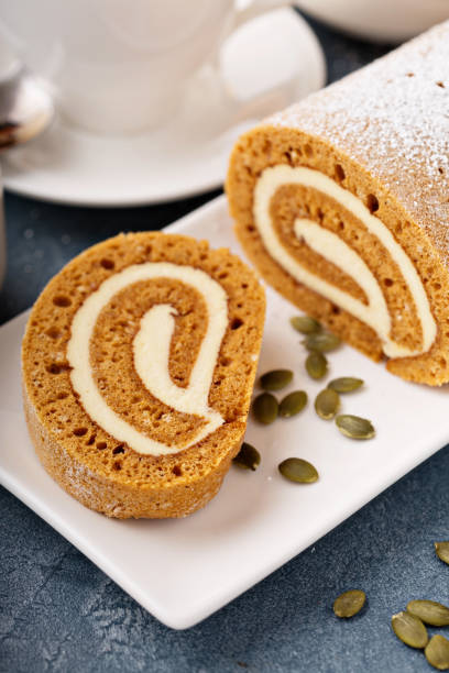 istock Pumpkin roll with cream cheese frosting 882698390