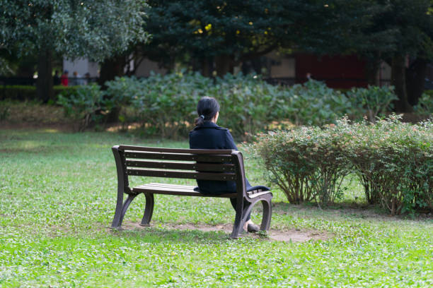 istock Lively woman in the park 882698422