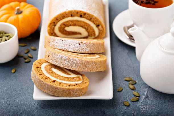 istock Pumpkin roll with cream cheese frosting 882698452