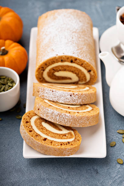 istock Pumpkin roll with cream cheese frosting 882698532