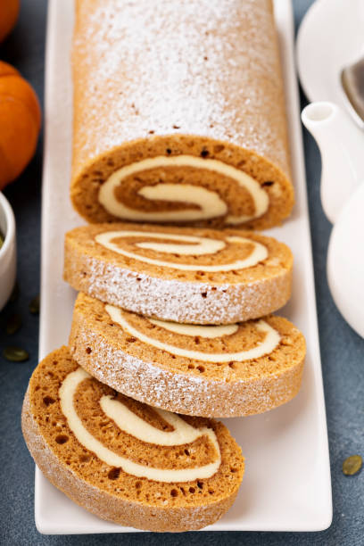 istock Pumpkin roll with cream cheese frosting 882698568