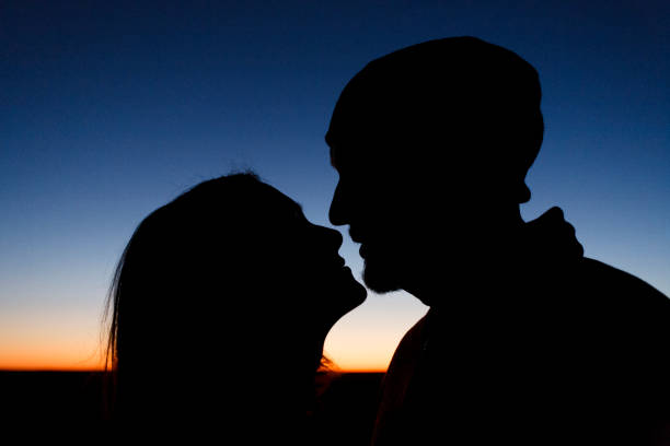 istock Couple hiking together in the wilderness 882698910
