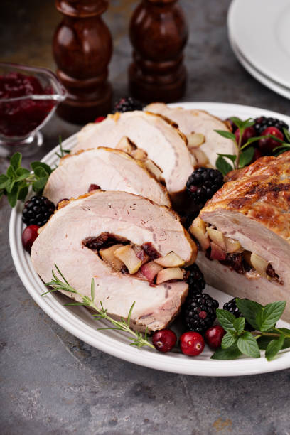 istock Roasted pork loin stuffed with apple and cranberry 882701570