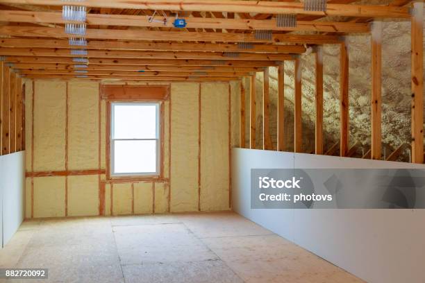 Thermal And Hidro Insulation With Spray Foam At House Construction Stock Photo - Download Image Now