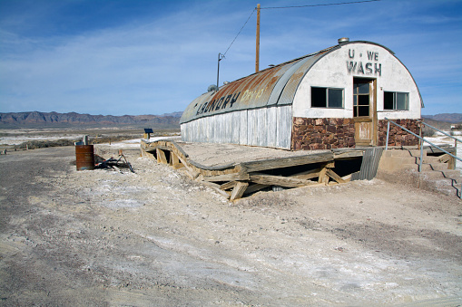 Rusted Drive Thru and Desserted Laundry Hut in Tecopa Hot Springs, Death Valley National Park, America. Shot in HDR