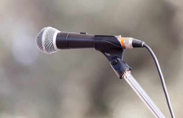 istock microphone on the stand on the nature 882731828