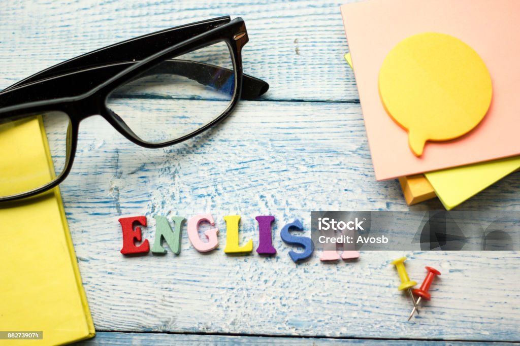 English word composed from colorful abc alphabet block wooden letters, copy space for ad text. Education concept English word composed from colorful abc alphabet block wooden letters, copy space for ad text. Education concept. English Language Stock Photo