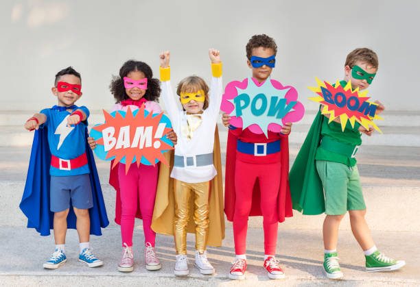 superhelden-kinder mit superkräften - people behavior authority clothing stock-fotos und bilder