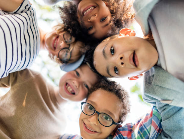 istock Happy kids in the park 882748230