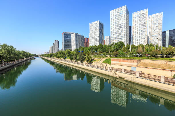 istock Business district office buildings and water reflection in Beijing 882753528