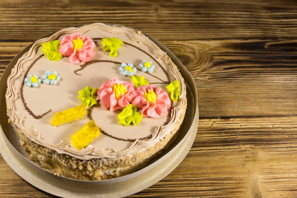 istock Cardboard box with Kiev cake with cream, nuts and meringue 882766428