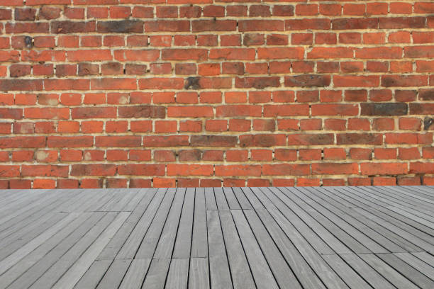 istock Brick wall  Wooden deck  Old house 882777836
