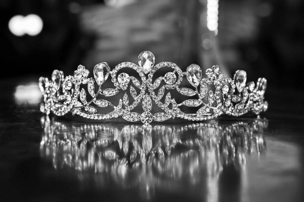 Tiara on Black Background Tiara, crown - headwear, queen - royal person, wedding crown, diamond - gemstone, diamond shaped photos stock pictures, royalty-free photos & images