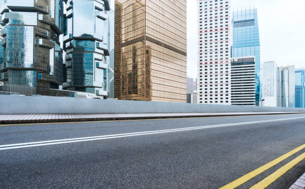 istock empty urban road in downtown,Hong Kong 882795238