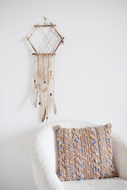 istock Knitted cushion and dream catcher 882795488