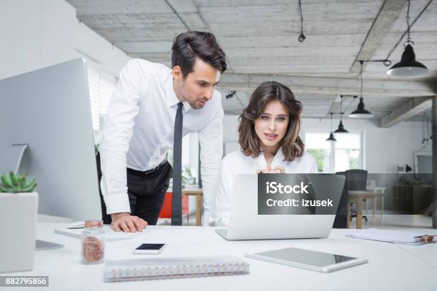 Business Professionals Working Together In Office Stock Photo - Download Image Now - Business Person, Disappointment, Laptop